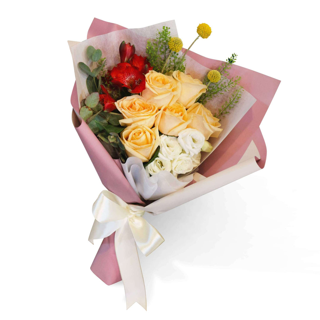 flowerbouquet-champagne-rose-eustoma-alstroemeria-Craspedia-white-anpink-wrapper-with-white-background