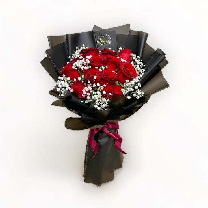 bouquet-of-12-stalks-red-roses-with-babys-breath-wrapped-in-black-front