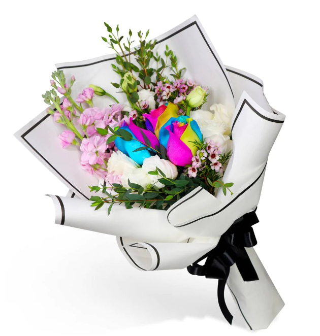 flowerbouquet-rainbow-rose-eustoma-matthiola-waxflower-mini-eucalyptus-in-a-chic-white-wrapper-with-black-lining-set-against-a-clean-white-background
