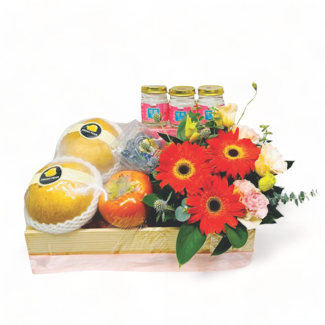 hamper-japanese-fruits-6-bottle-of-Eu-Yan-Sang-bird-nest-gerbera-eustoma-with-white-background