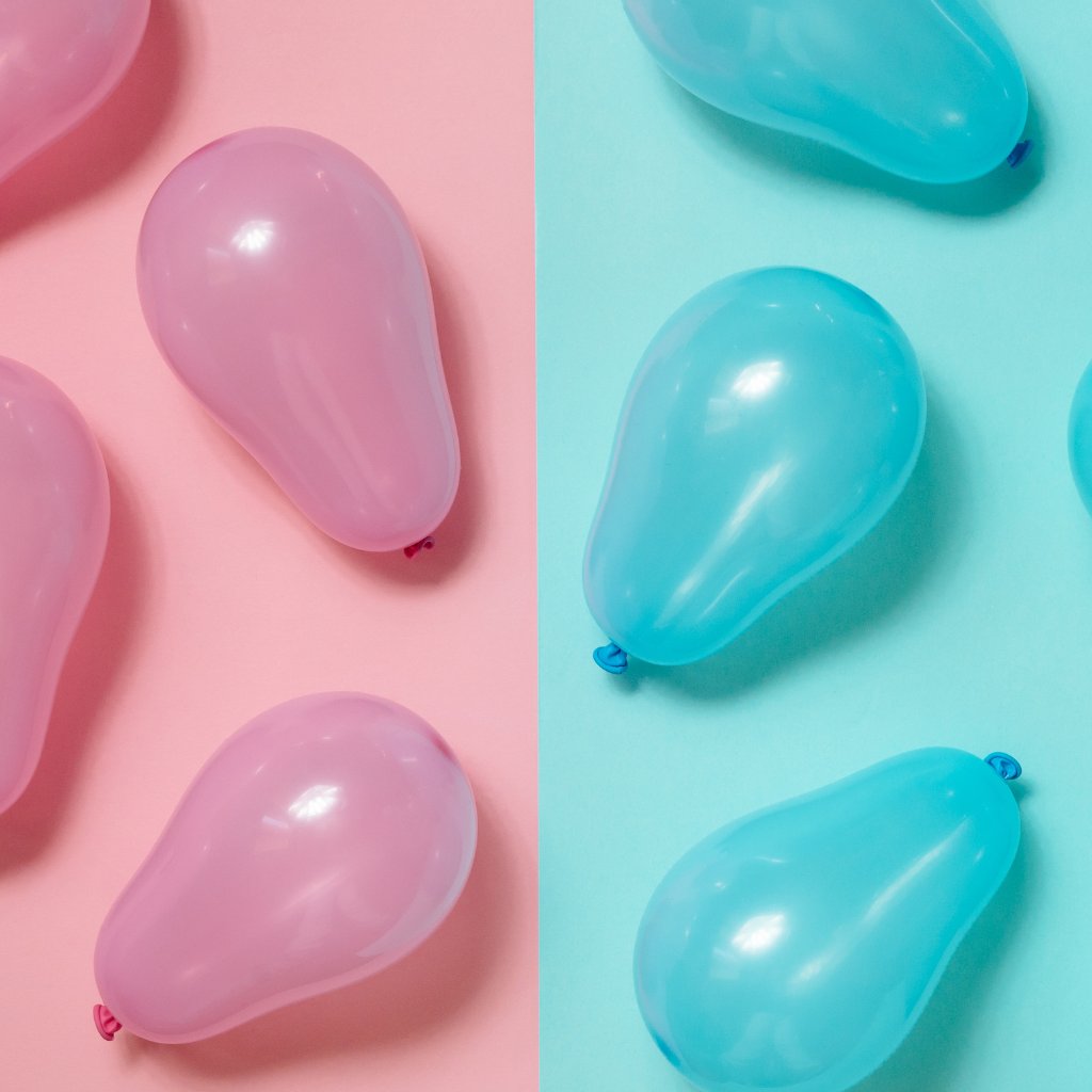 A split image with pink balloons on the left and blue balloons on the right for gender reveal party and flowers singapore