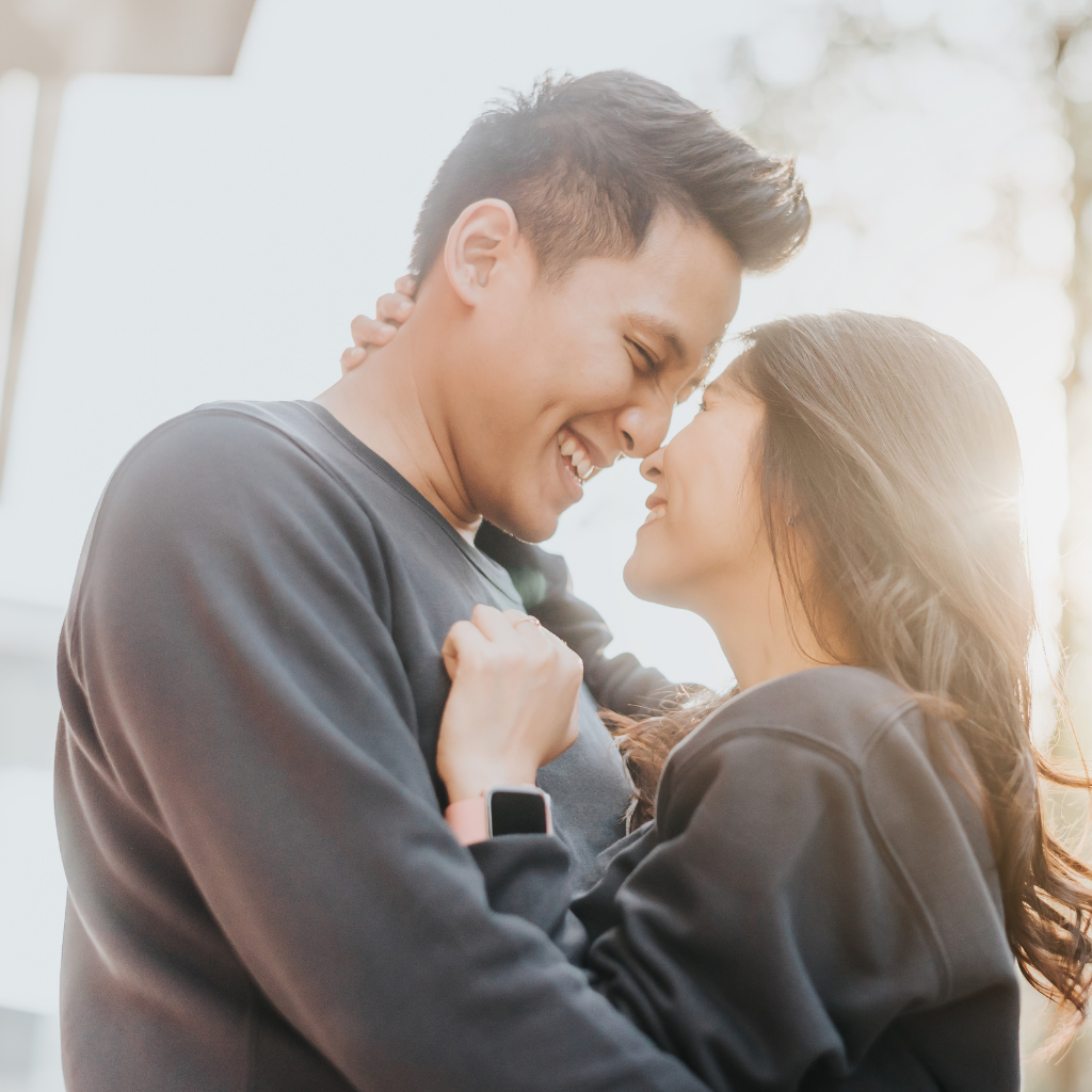 Love-&-Romance-couple-looking-at-each-very-intimate-in-public