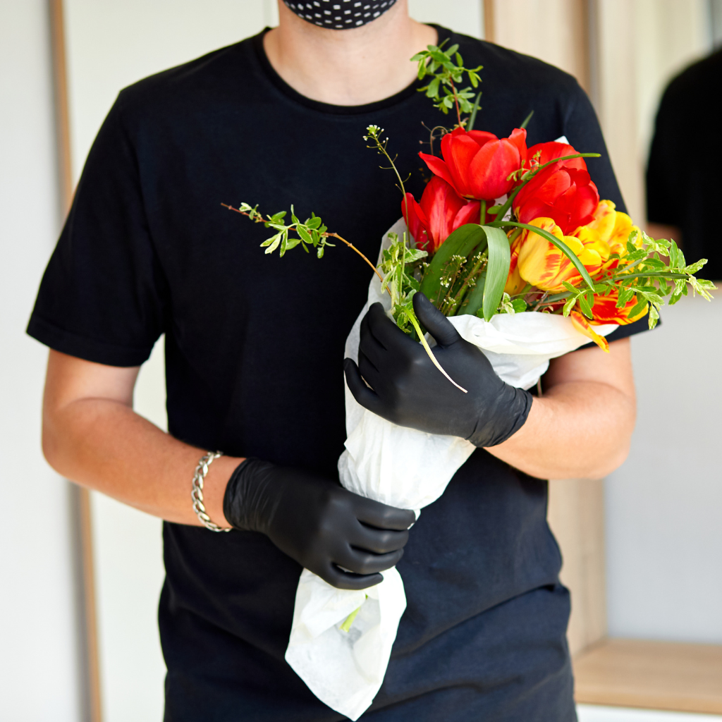 man delivery bouquet of flowers
