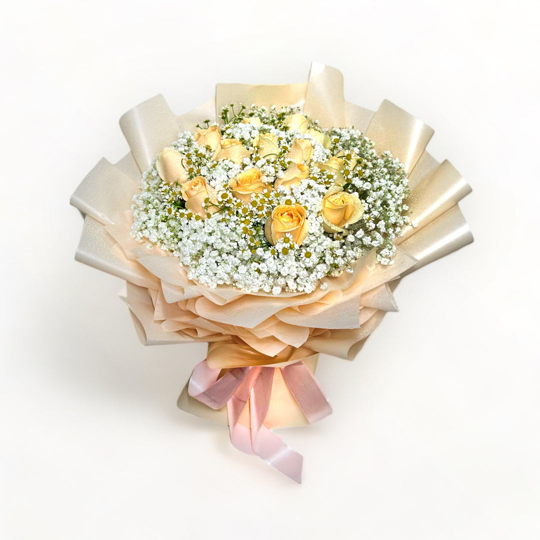 flowerbouquet-champagne-roses-babys-breath-daisies-pink-ribbon-with-white-background