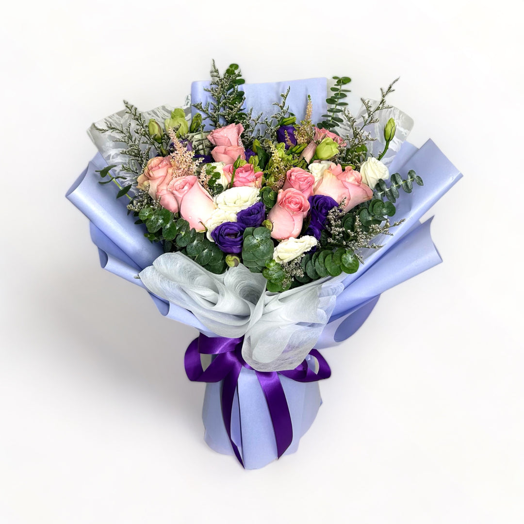 flowerbouquet-roses-eustoma-misty-blue-caspia-eucalyptus-purple-wrapper-with-white-background
