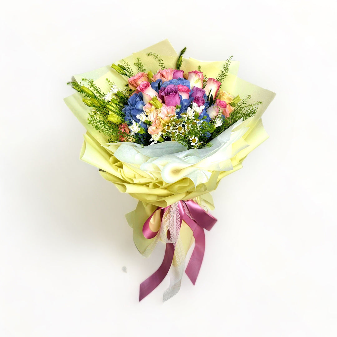 flowerbouquet-blue-hydrangea-roses-eustoma-daisies-carnation-gren-bell-yellow-wrapper-with-white-background
