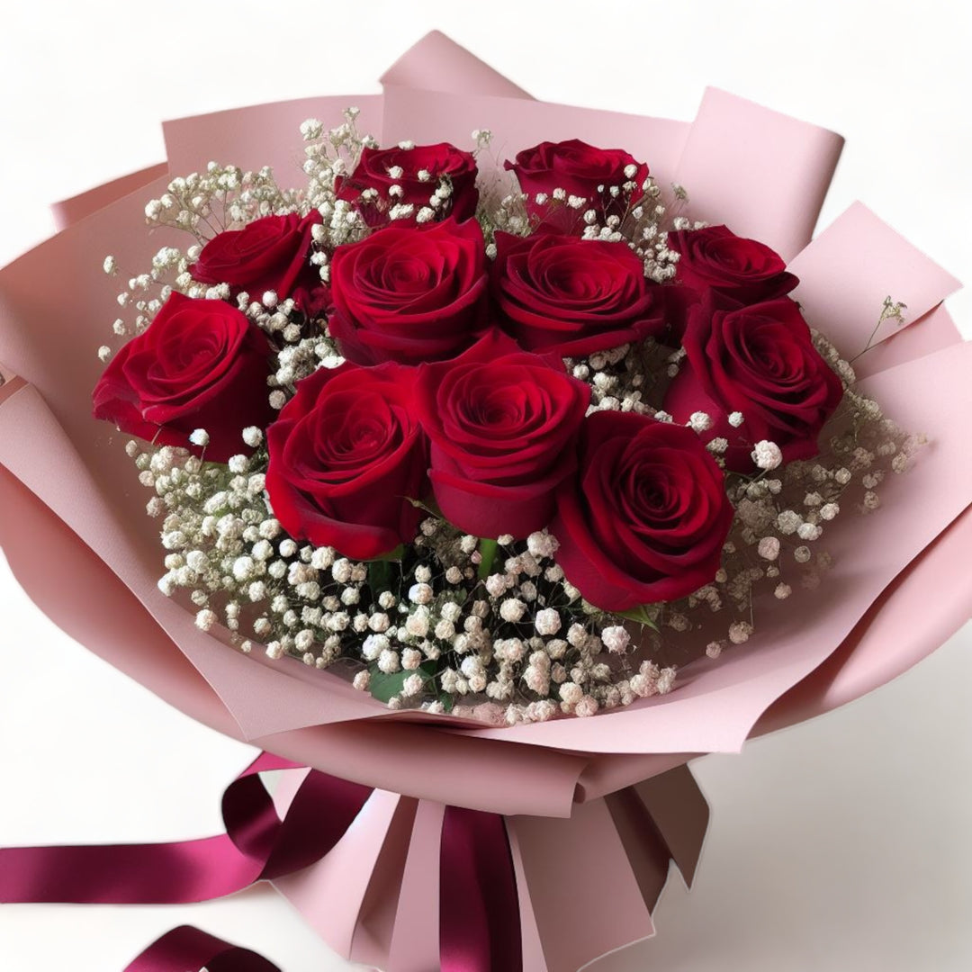 flowerbouquet-red-roses-baby-breath-pink-wrapper-dark-red-ribbon-with-white-background