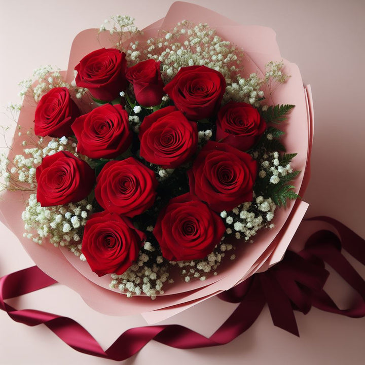 flowerbouquet-red-roses-baby-breath-pink-wrapper-dark-red-ribbon-with-view-of-the-top-seamlessly-blending-with-the-matching-pink-background