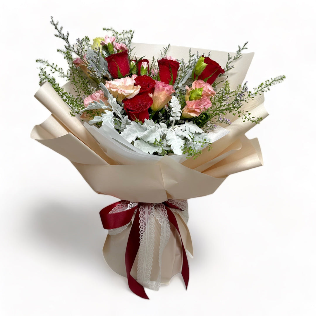 flowerbouquet-eustoma-red-roses-carnation-spray-cream-wrapper-and-dark-red-ribbon-with-white-background