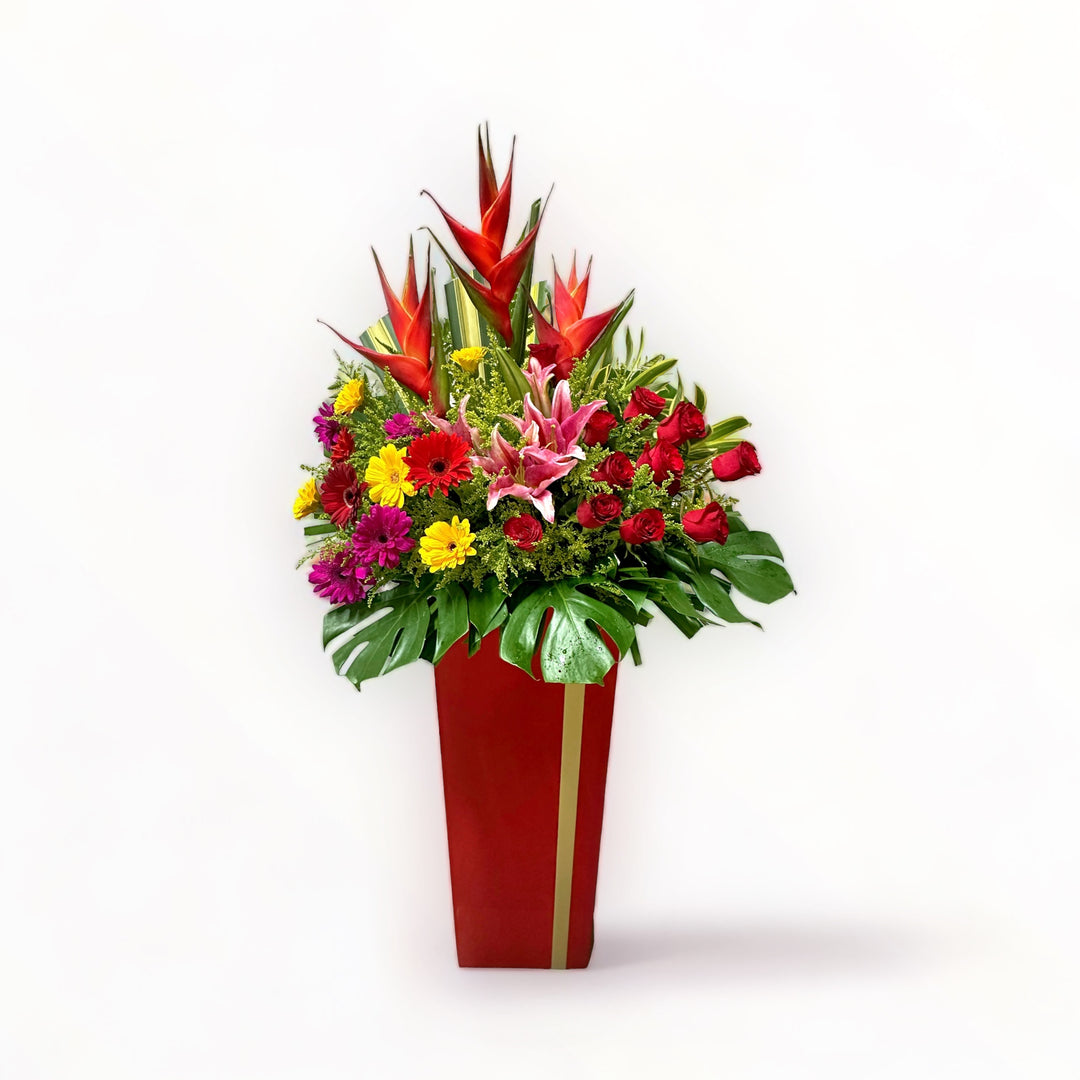 flowerstand-heliconia-lily-roses-gerberas-phoenix-songs-of-india-with-white-background