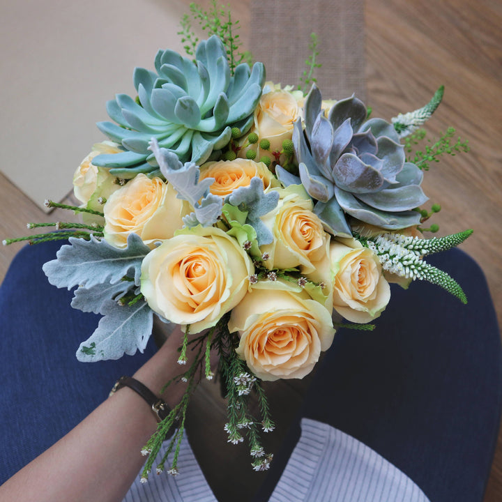 bridal-bouquet-succulents-champagne-roses-stem-wrapped-with-cream-ribbon-zoomed