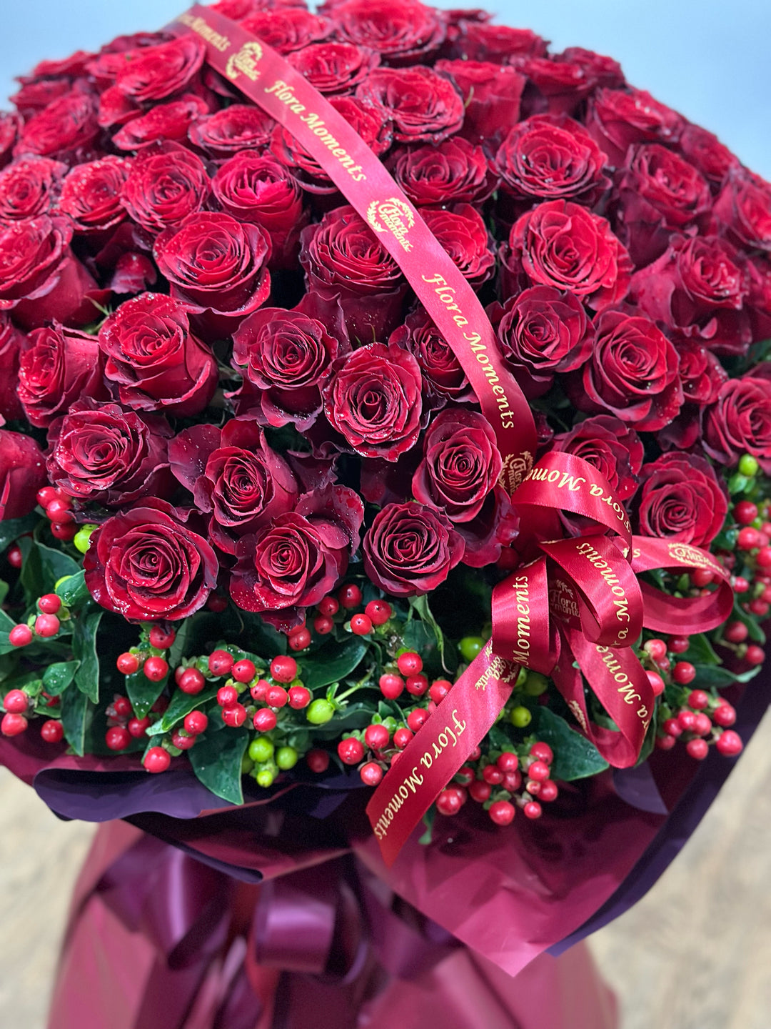 bouquet-red-roses-red-hepericum-zoomed.jpg