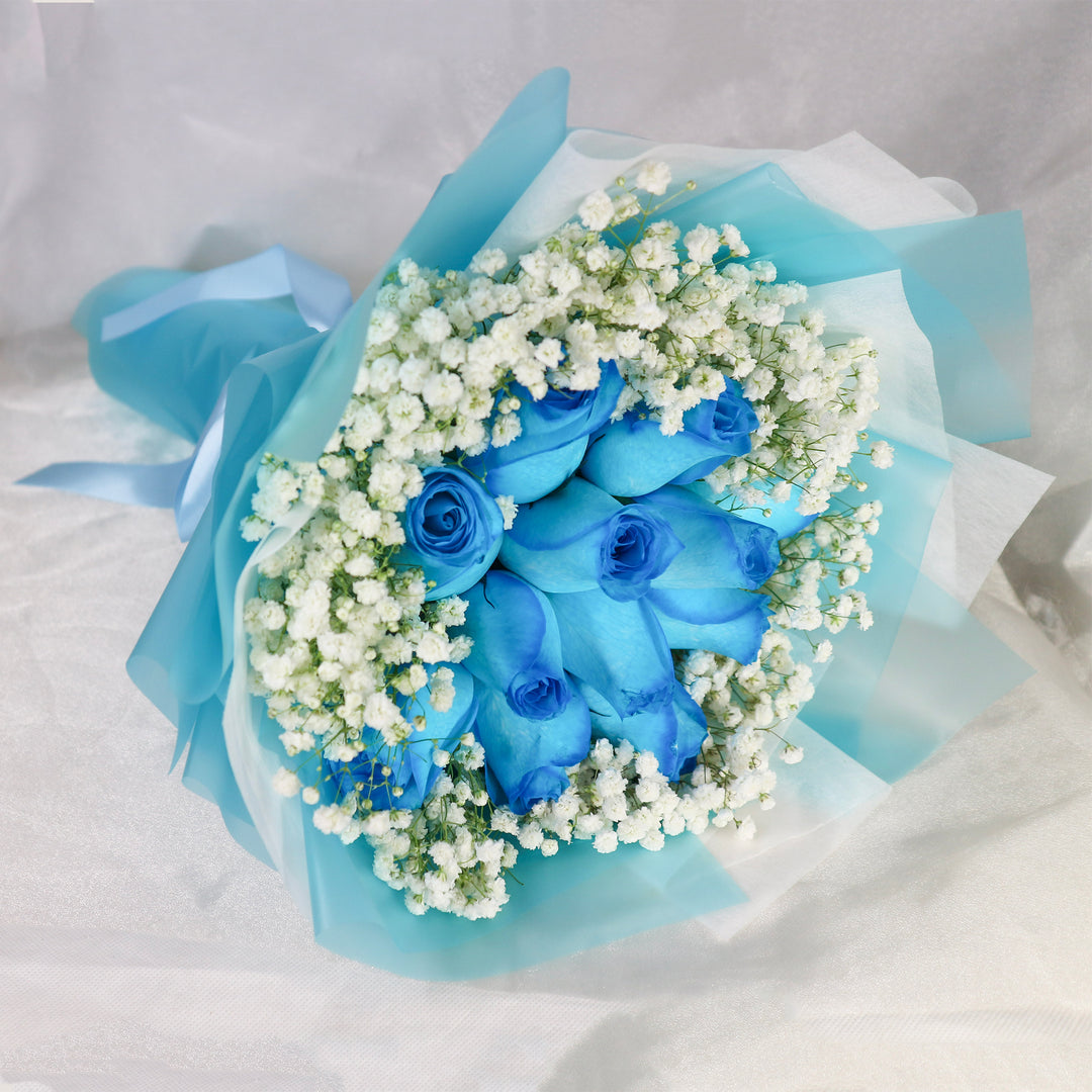 bouquet-blue-roses-and-baby_s-breath-in-blue-wrapper-right