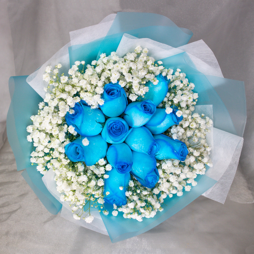 bouquet-blue-roses-and-baby_s-breath-in-blue-wrapper-top