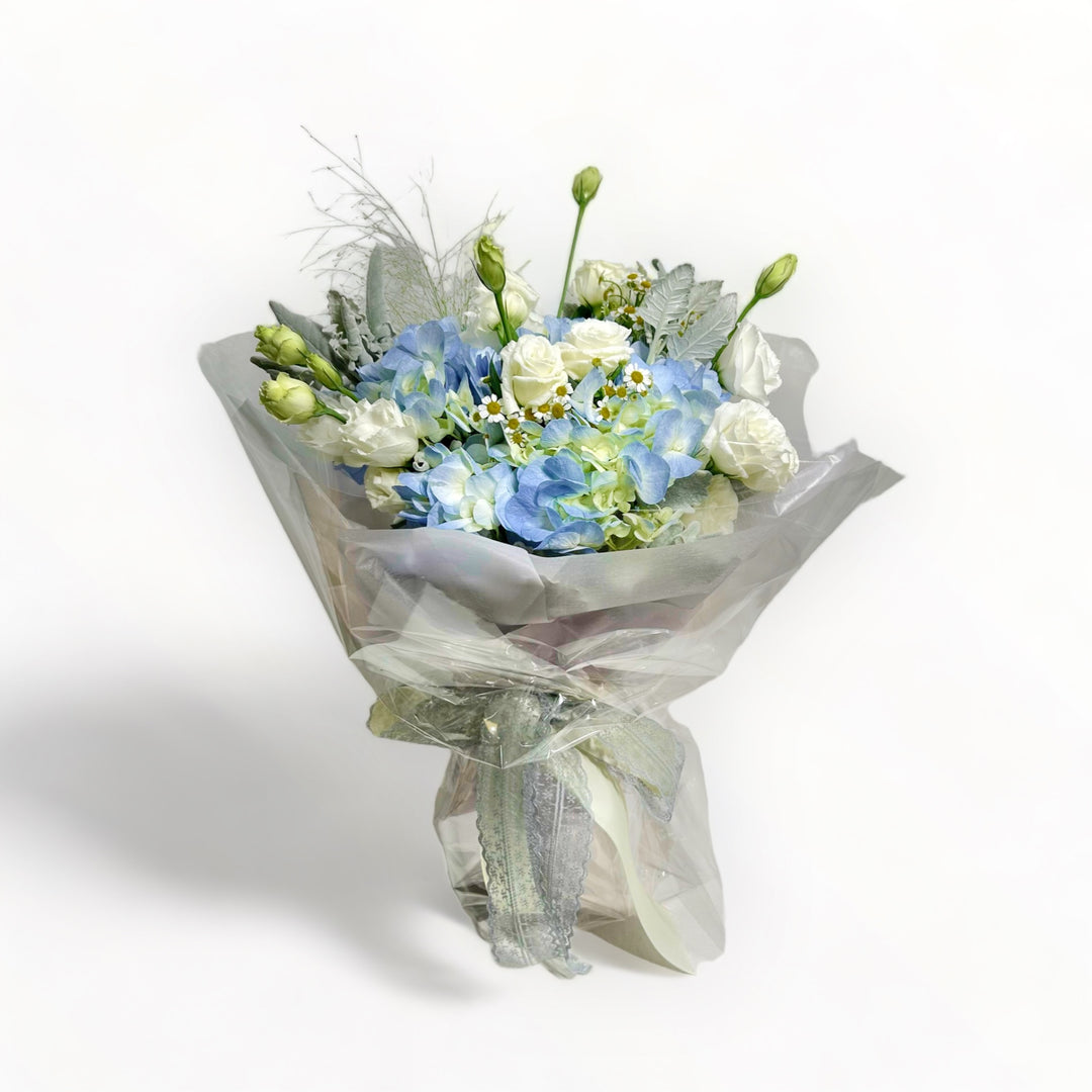 flowerbouquet-hydrangea-white-eustoma-daisies-silver-leaves-panicum-grey-wrapper-with-white-background 