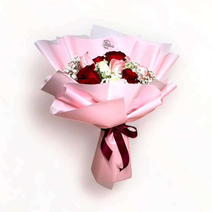 bouquet-of-12-stalks-red-pink-white-roses-with-babys-breath-wrapped-in-pink-front