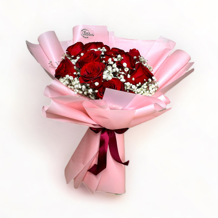 bouquet-of-18-stalks-red-roses-with-babys-breath-wrapped-in-pink-front