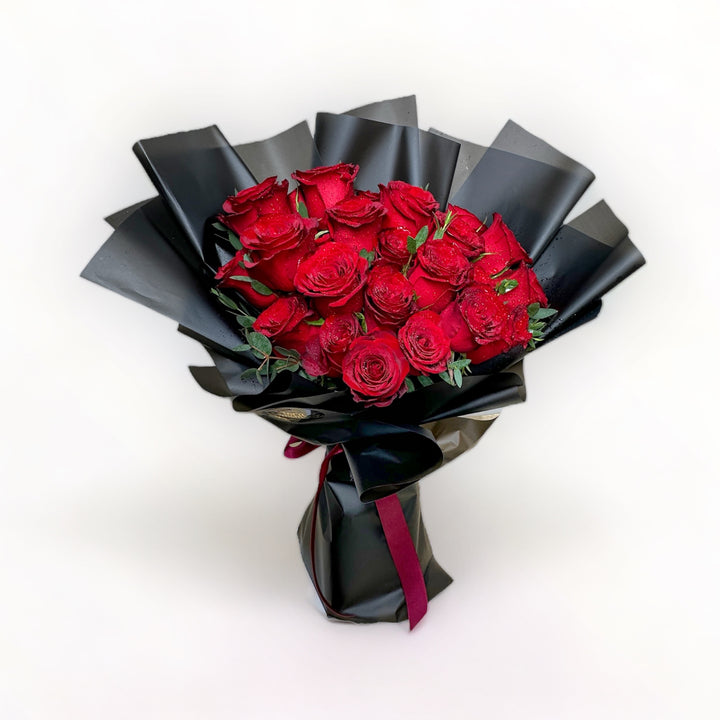 bouquet-of-24-stalks-red-roses-wrapped-in-black-top