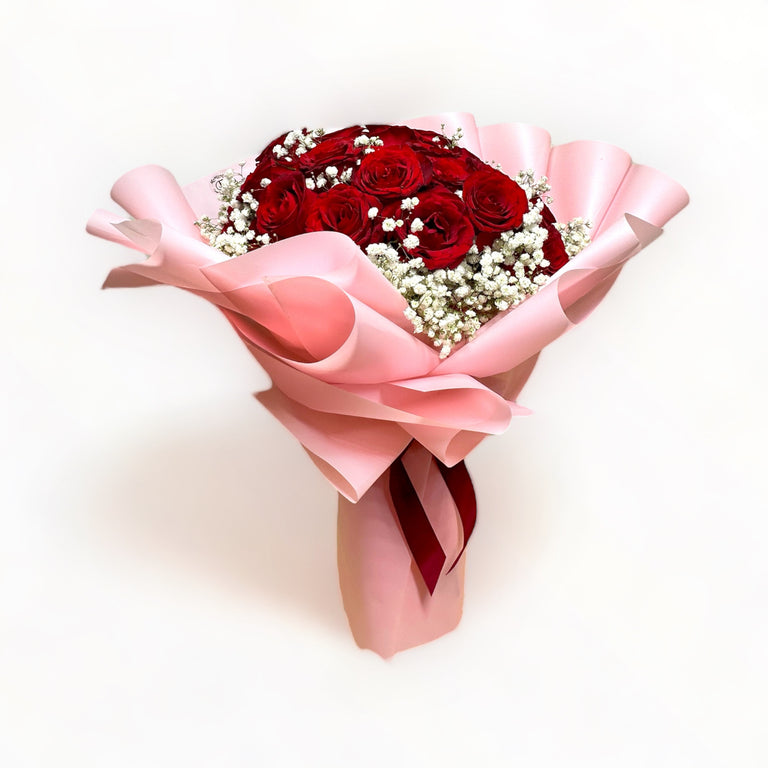 bouquet-of-34-stalks-red-roses-with-babys-breath-wrapped-in-pink-front