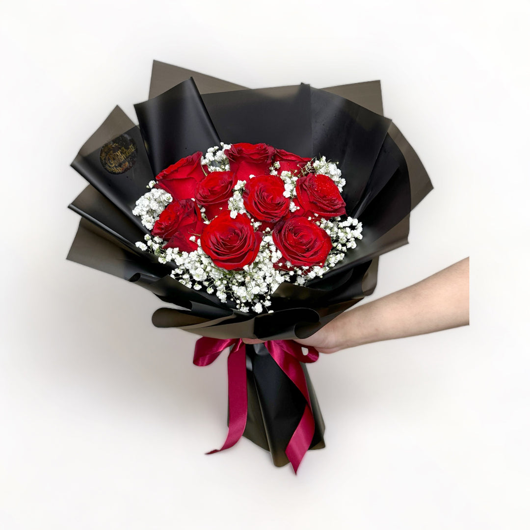 bouquet-of-9-stalks-red-roses-with-babys-breath-wrapped-in-black-hand