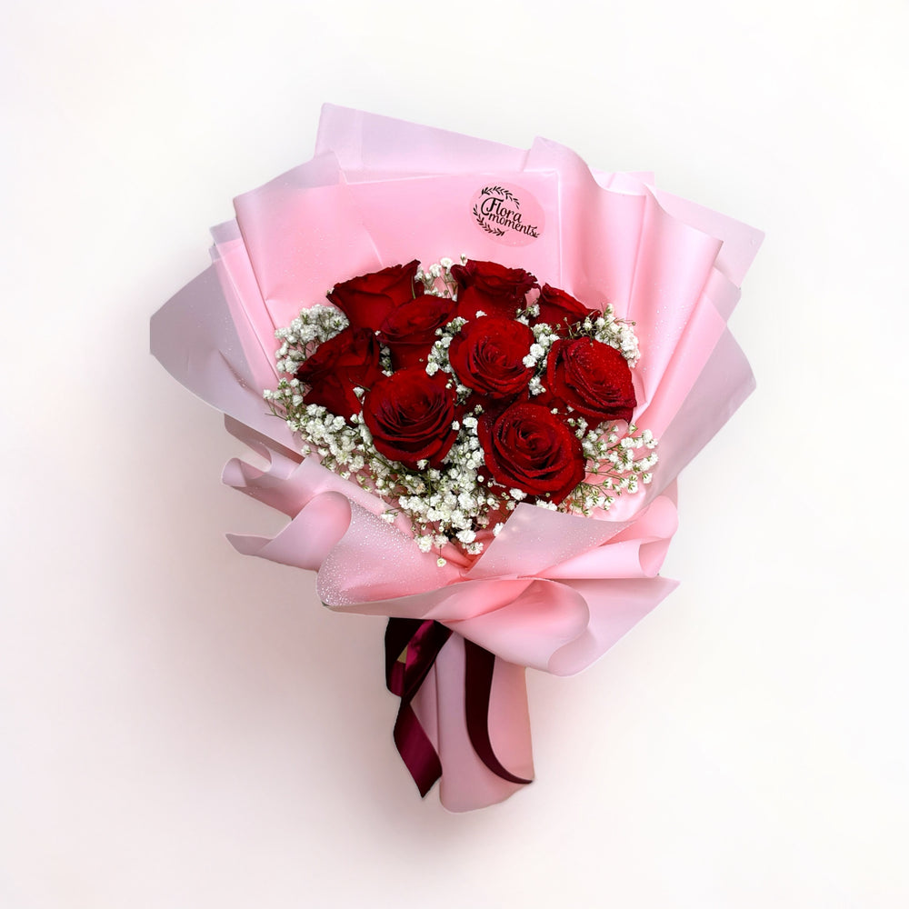 bouquet-of-9-stalks-red-roses-with-babys-breath-wrapped-in-pink-top