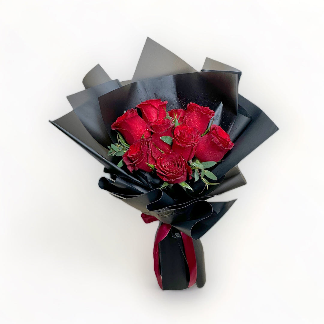 bouquet-of-9-stalks-red-roses-wrapped-in-black-top