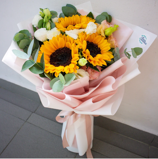 flowerbouquet-sunflower-eustoma-eucalyptus-pink-wrapper-and-pink-ribbon