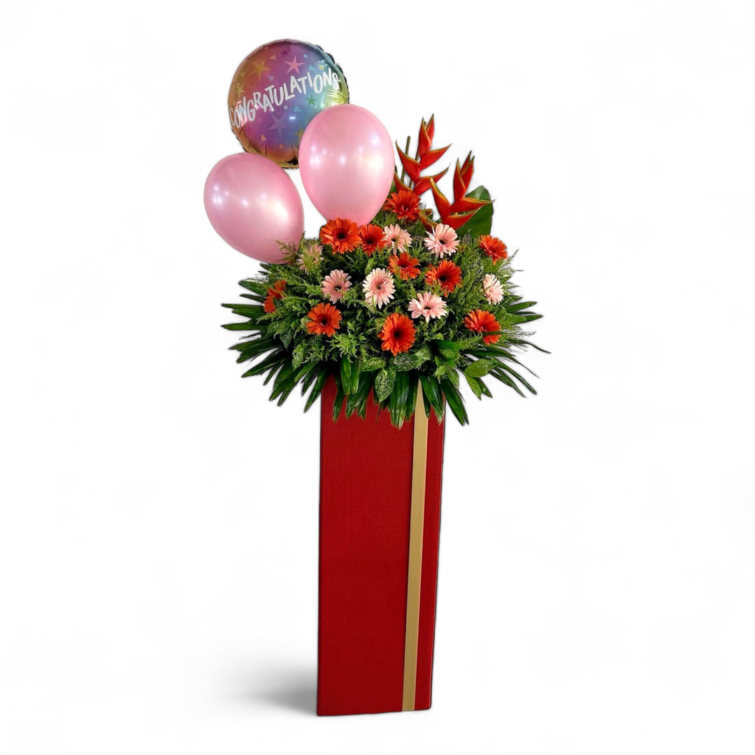 flowerstand-congratulations-foil-balloon-pink-latex-heliconia-gerberas-golden-front