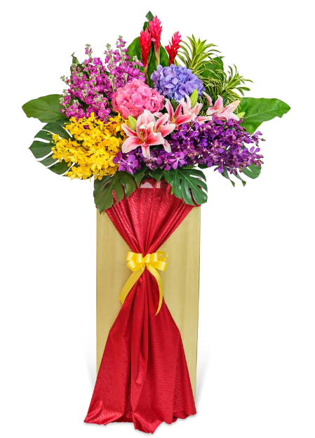 flowerstand-matthiola-lily-hydrangeas-orchids-red-ginger-songs-of-india-mostera-with-white-background