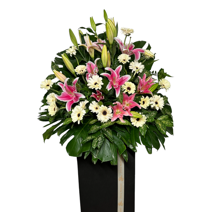 flowerstand-white-gerbera-pink-lilies-monstera-bamboo-leaves-cordyline-front
